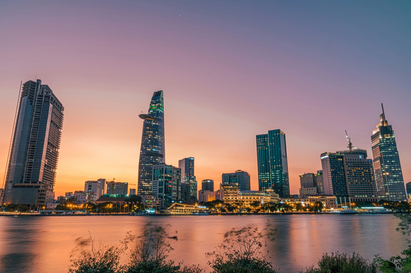 Ho Chi Minh City skyline glowing at dusk