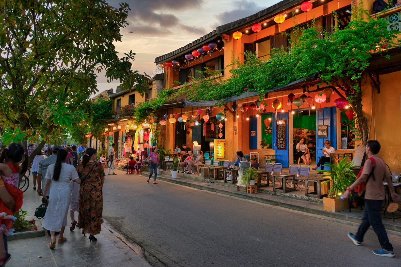 Lanterns glowing over the old town of Hoi An at dusk